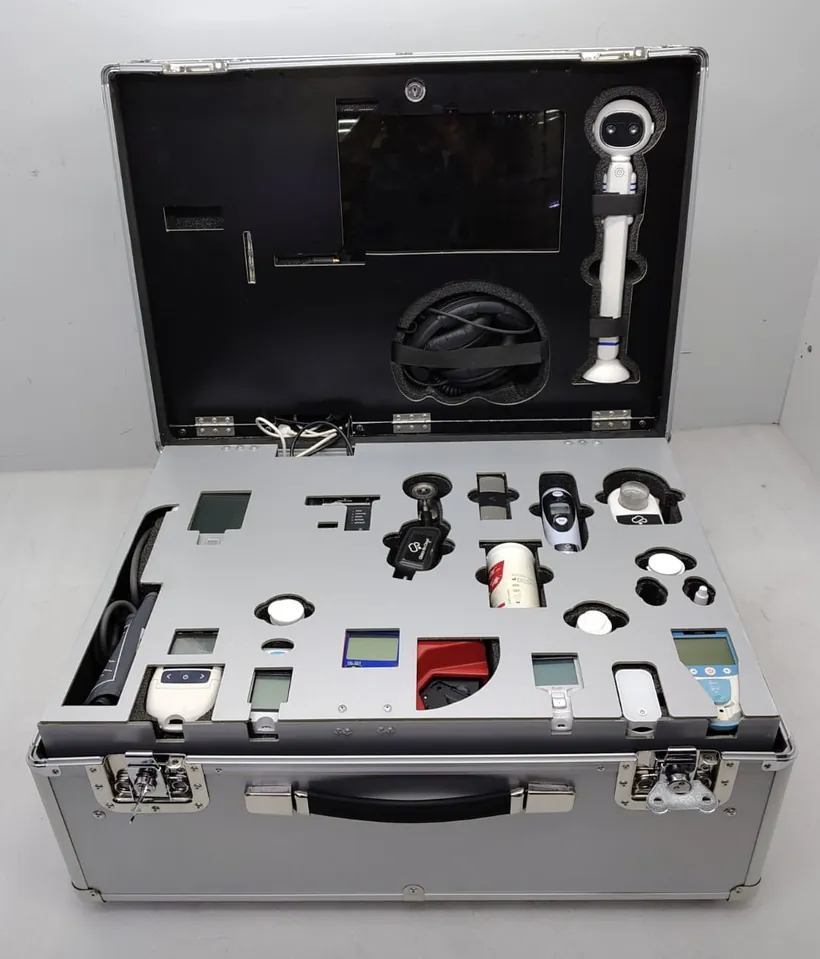 A Clinics On Cloud Box Clinic open, devices in foam slots with the tablet in the lid